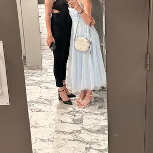 This is a nice blue dress, it has string to tie the back, back exposed a lot.